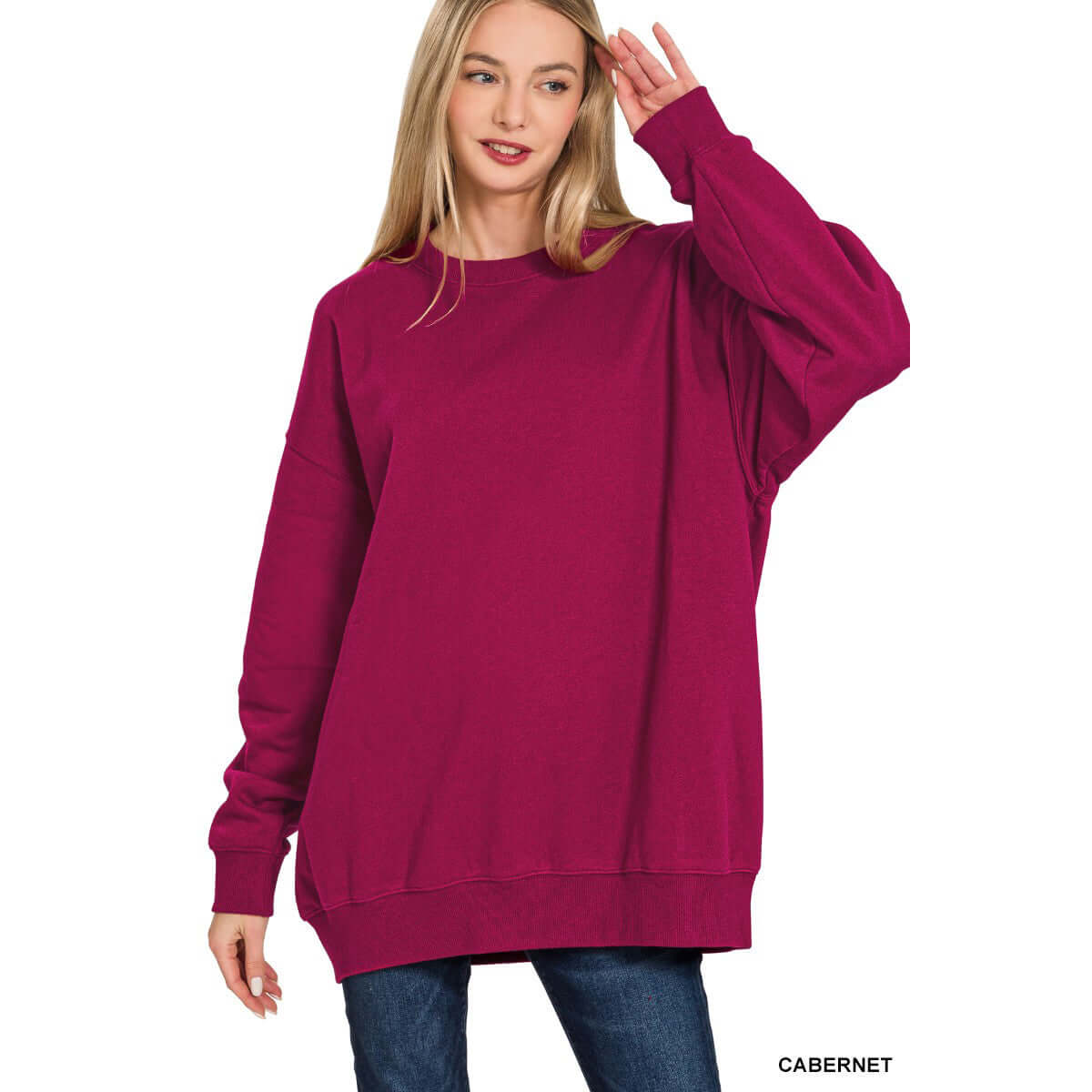 Woman wearing HEARTHSIDE MOMENTS PULLOVER in Cabernet color, showcasing its relaxed fit and cozy style.