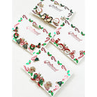 Cute Christmas Theme Sparkly Earrings displayed on decorative cards featuring holiday designs.