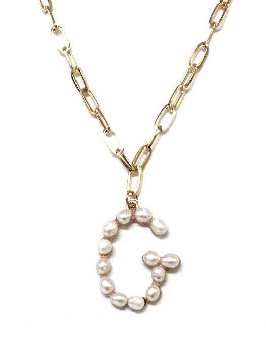 PEARL ESSENCE MONOGRAM NECKLACE by Avenue Zoe featuring freshwater pearls on a gold-tone chain.