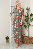 Women's floral shirred maxi dress, short sleeve, flowy silhouette in gray with red flowers. Made in USA.