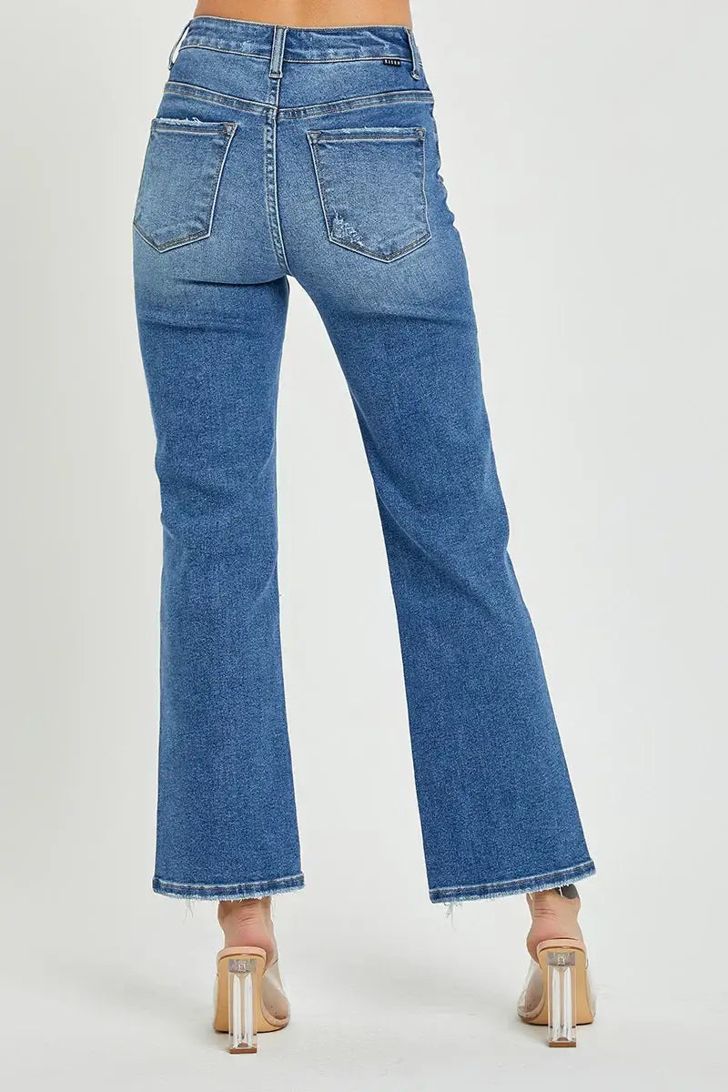 Back view of Risen Nora Jeans with frayed hem and medium dark wash, showcasing relaxed straight fit and comfortable stretch.