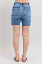 Back view of JUDY BLUE MIDRISE DAKOTA SHORTS showing flap pockets and comfortable fit.
