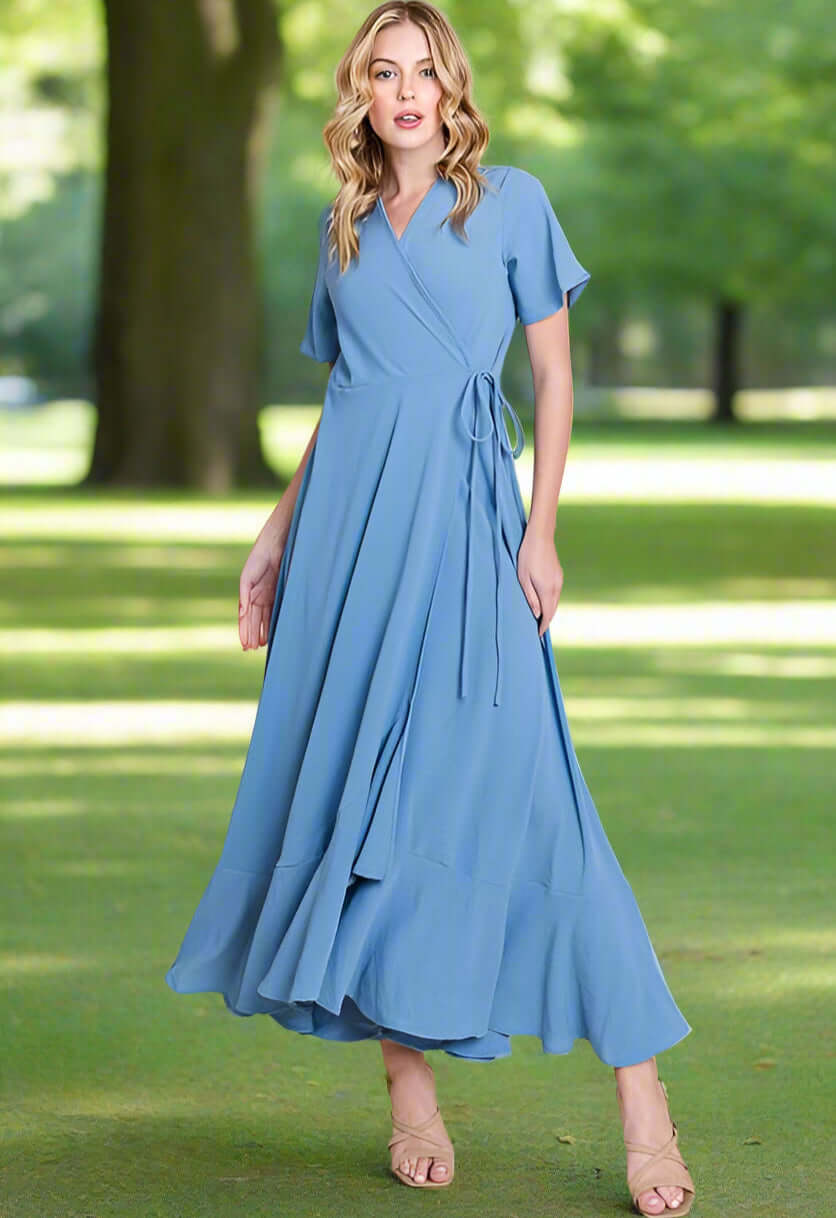 Breezy Blue Maxi Dress by BomBom, featuring a high/low hem and wrap style, ideal for elegant occasions.