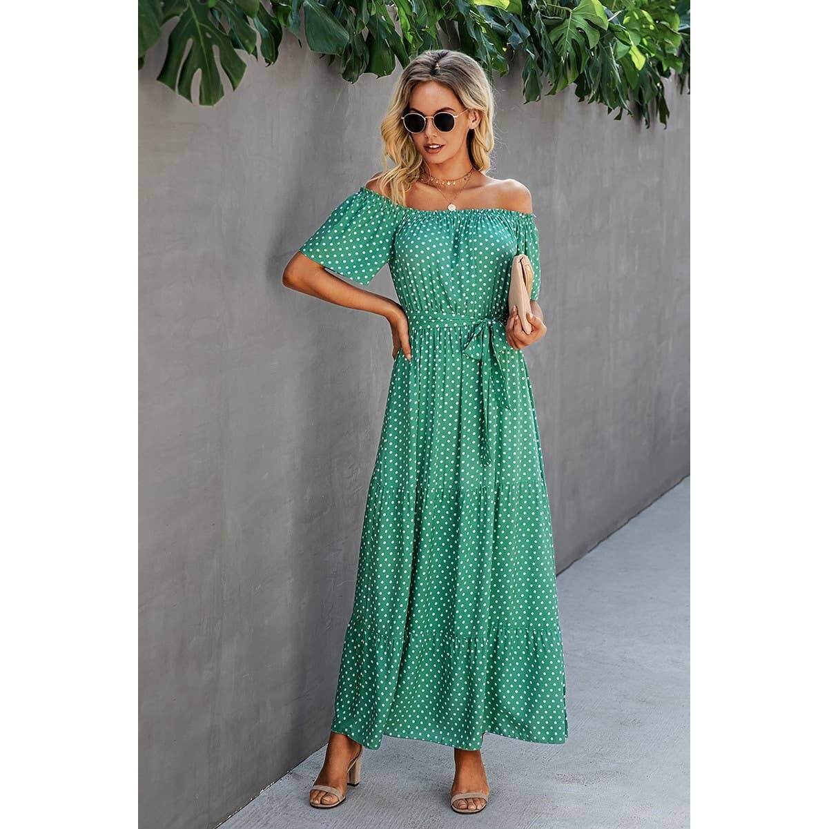 Off shoulder green polka dot maxi dress with waist tie and ruffles, perfect for casual outings and vacations.