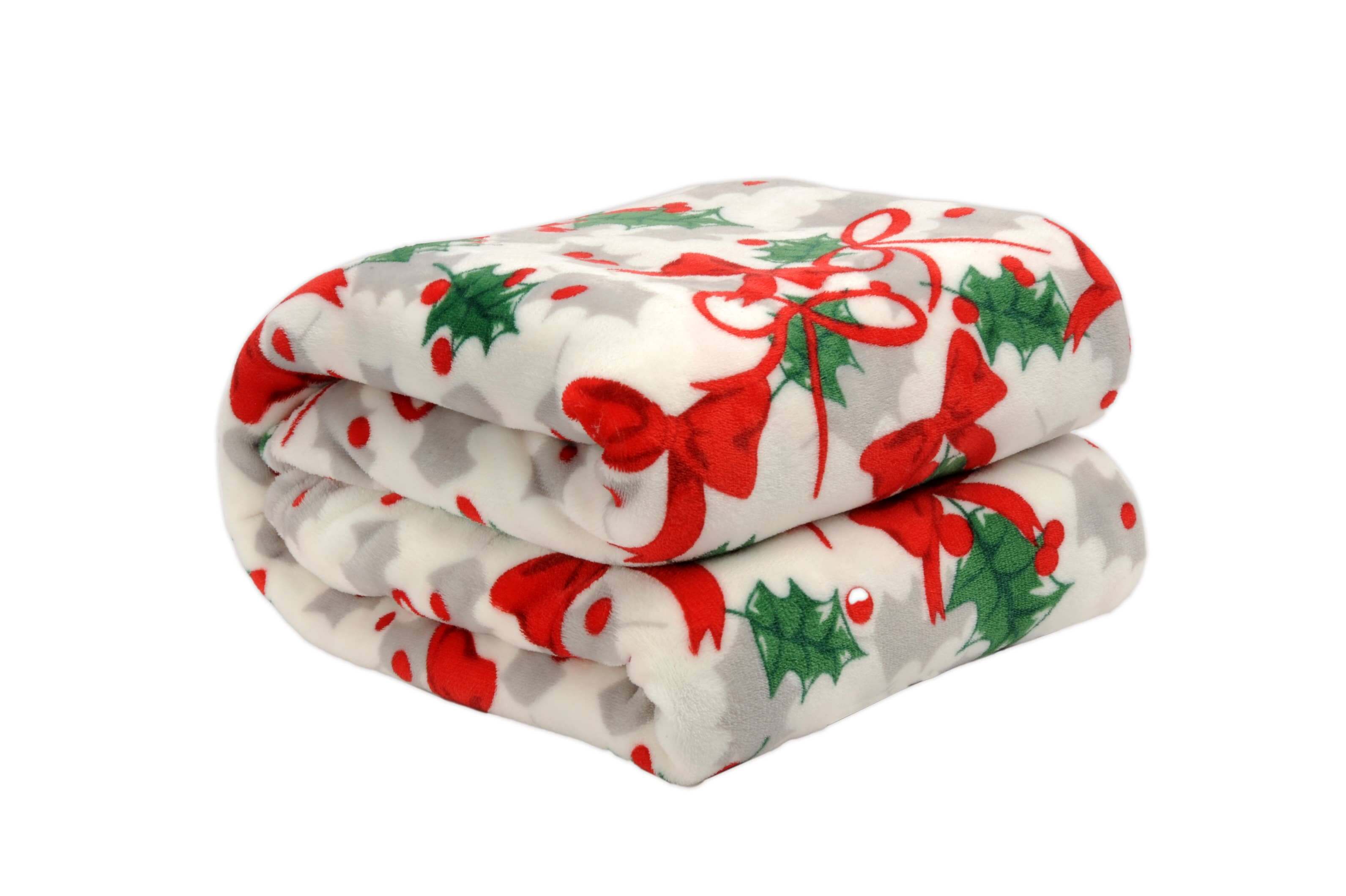 Christmas Cheer Plush Throw Blanket with festive holly and bow design by Kathy Ireland, folded and ready for cozy winter nights.