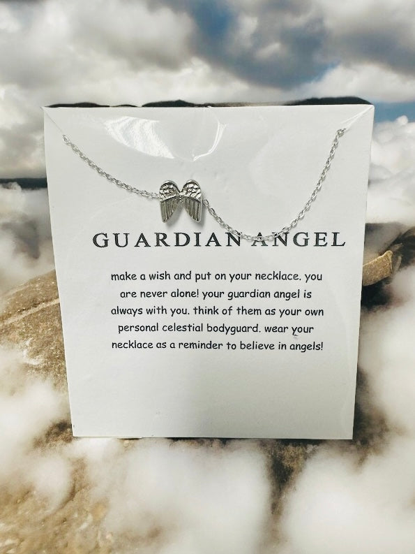 Stunning guardian angel necklace on a card with uplifting message about belief and protection.