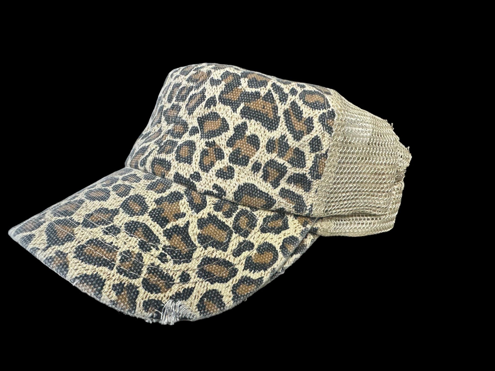 Leopard print trucker hat with distressed twill design and mesh back for a stylish, comfortable look.