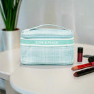 Love and Peace striped handle bag in light blue, stylish and chic accessory for any outfit.