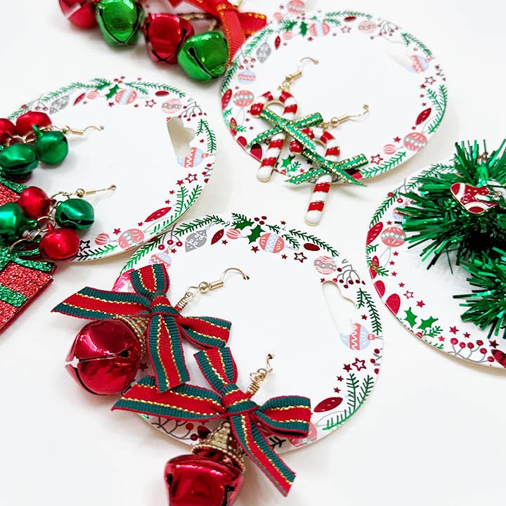 Christmas Theme Dangle Earring Set featuring assorted festive designs with bells and ribbons, perfect for the holiday season.