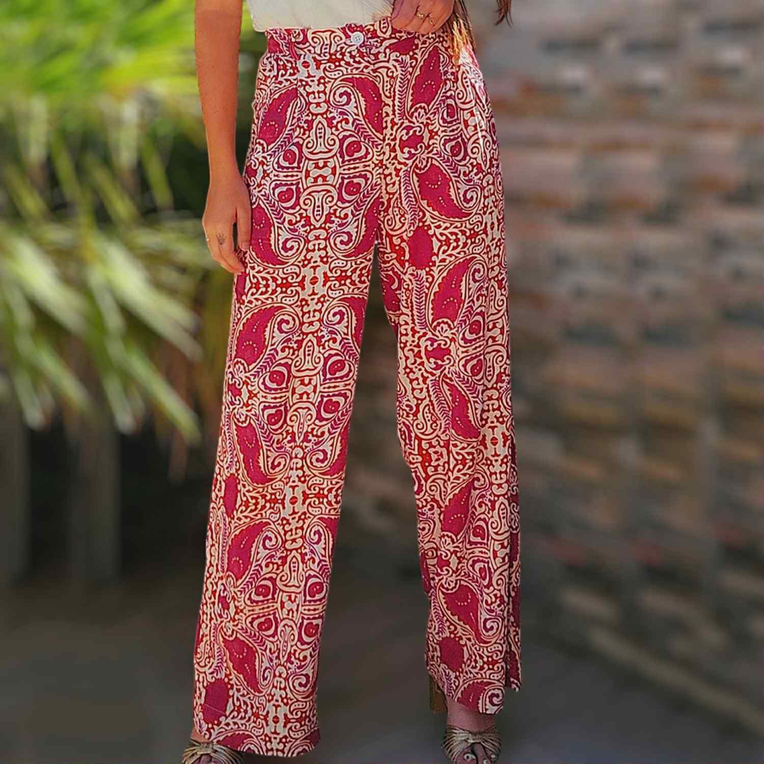 Chic red and cream Boho Glam wide leg pants with abstract motif, featuring high waist and functional pockets.