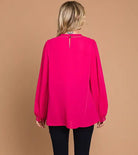 COSMO CUTIE - Cotton Bleu by Cotton Bleu $20.00 Add a pop of bright color to your wardrobe with this fuchsia top. With the ladder trim at the neck and cuffs, it's both cute and elegant. Plus, the keyhole closure in the back adds an extra touch of charm. P