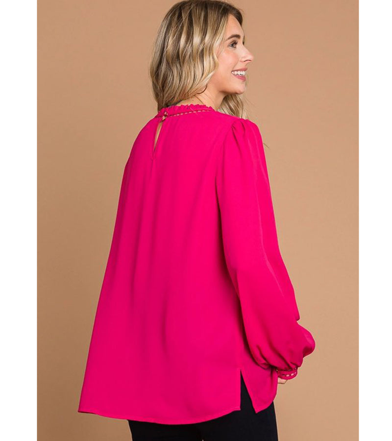 COSMO CUTIE - Cotton Bleu by Cotton Bleu $20.00 Add a pop of bright color to your wardrobe with this fuchsia top. With the ladder trim at the neck and cuffs, it's both cute and elegant. Plus, the keyhole closure in the back adds an extra touch of charm. P