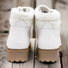 FIRST SNOW ANKLE BOOTS by Not Rated by Not Rated by Naughty Monkey $40.00 These First Snow Ankle Boots in Artic White by Naughty Monkey are a stylish addition to any winter outfit. With a cute lace up design and faux fur trim, they add a touch of pizazz t