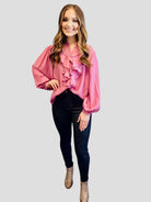 FOUND MY FRILL Top - Easel by Easel $20.00 This silky smooth button-up top exudes luxury, with an abundance of charming ruffle accents. All in a charming shade of pink. By Easel 90% Rayon, 10% Polyester Teal Tiger Boutique