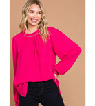 COSMO CUTIE - Cotton Bleu by Cotton Bleu $20.00 Add a pop of bright color to your wardrobe with this fuchsia top. With the ladder trim at the neck and cuffs, it's both cute and elegant. Plus, the keyhole closure in the back adds an extra touch of charm. P