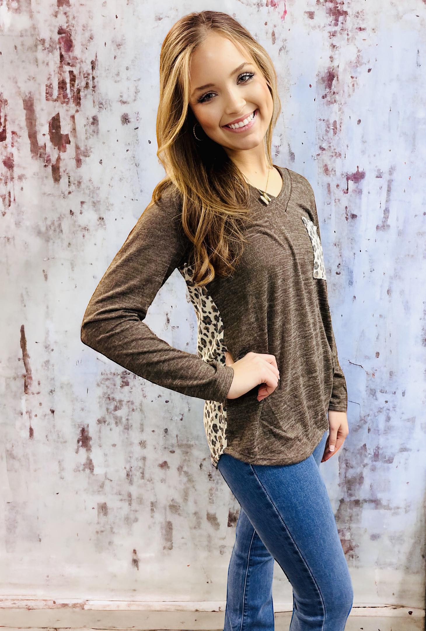 UNTAMED STYLE Top by Hemish in Chocolate by HEMISH $20.00 Embrace a daring style with this bold top featuring a luxe, long-sleeved design. Crafted with expertise, it showcases dynamic color-block elements and a wild animal print on the pocket and back pan