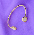 ENCHANTED Cuff Bracelet by Teal Tiger Boutique $14.00 This KS-inspired cuff bracelet is absolutely stunning with a sparkling hexagon-shaped stone set in a beautiful gold tone. You will be enchanted by its charm and beauty. Teal Tiger Boutique