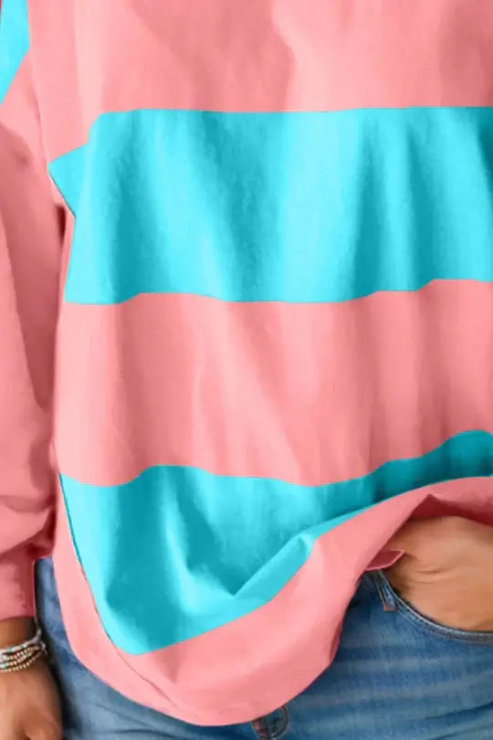 Blue and pink color block crew neck top with striped pattern and drop shoulder design