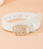 Rhinestone Circles Belt (white) by Teal Tiger Boutique $16.00 Indulge in the luxurious elegance of our white belt, adorned with round rhinestone circles and highlighted by a stunning gold tone underlay. 1.25 inches wide and 38 inches long Teal Tiger Bouti