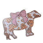 Simply Southern Freshiez air freshener in cow shape with bow, perfect for adding fun and scent to small spaces.