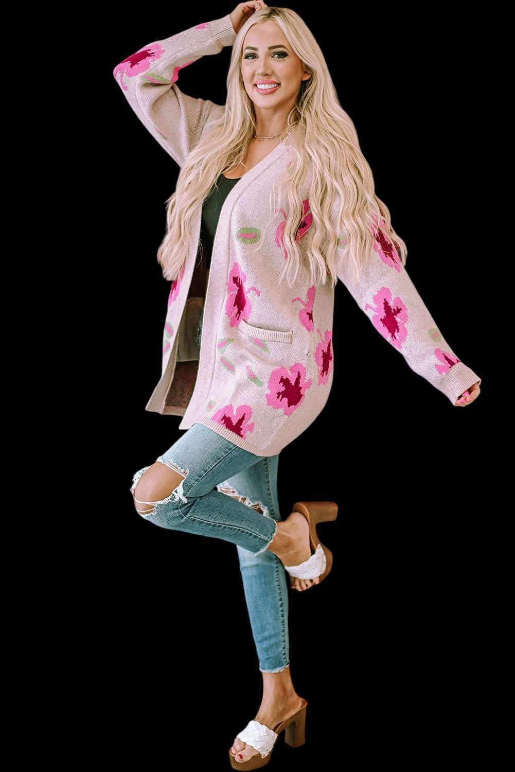 Woman wearing a CARDI GIRL floral open-front cardigan with jeans and sandals, showcasing its elegant and fashionable design.