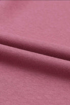 Close-up of the soft mauve fabric of the Lasting Friendship top, showcasing its cozy texture and relaxed fit.