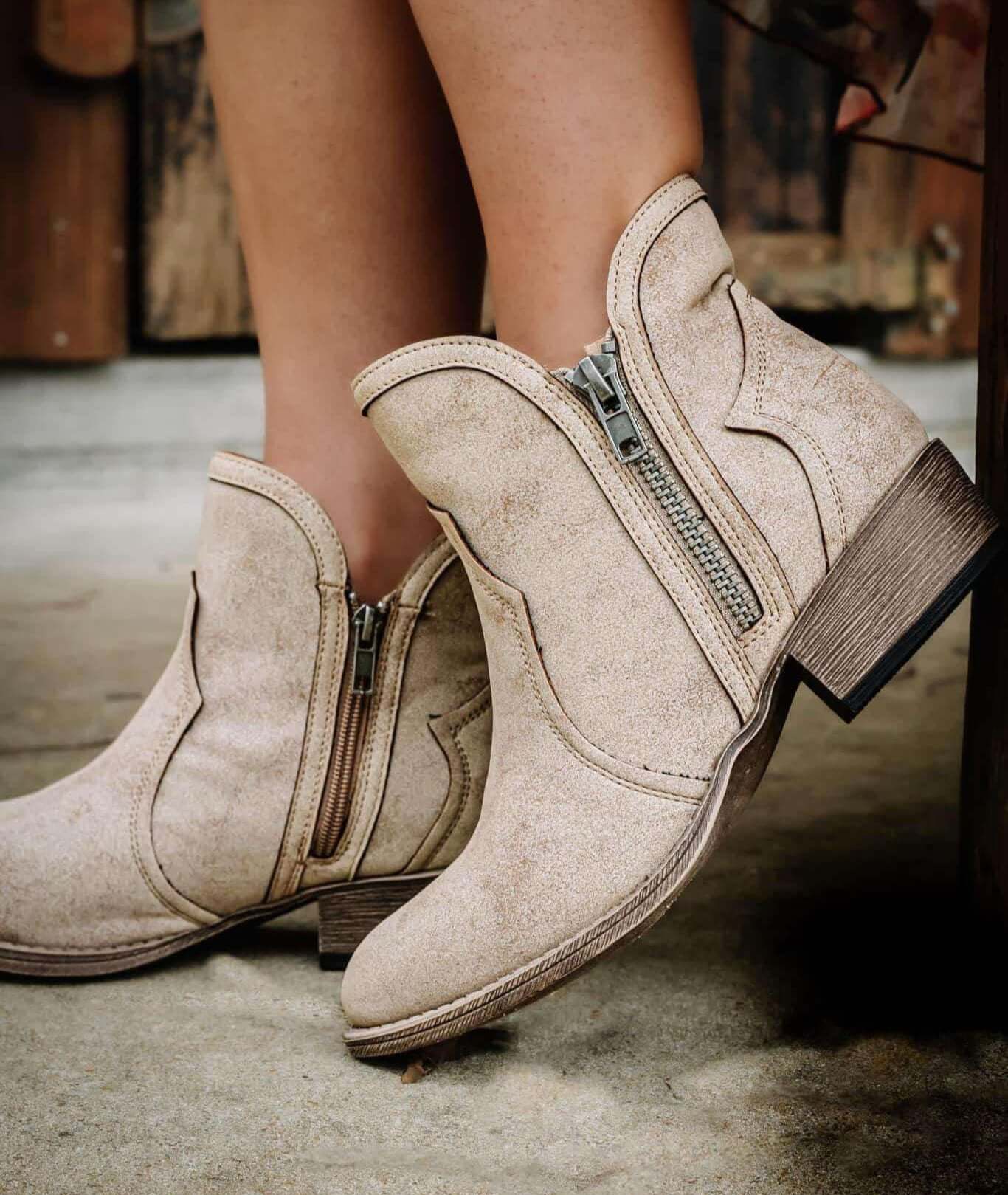 Cream distressed faux suede Evie booties with zippers and 1.5" heel, designed for comfort and style by Very G.