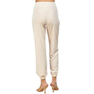 Smooth Operator Velvet Joggers in beige by See & Be Seen, featuring a cozy, stretchy fit and luxurious fabric.