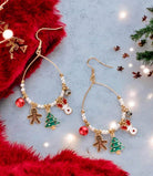 Festive Gingerbread Earrings by Vivian-Lu featuring charms of gingerbread man, Christmas tree, and red ball, adorned with faux pearls and gold beads.