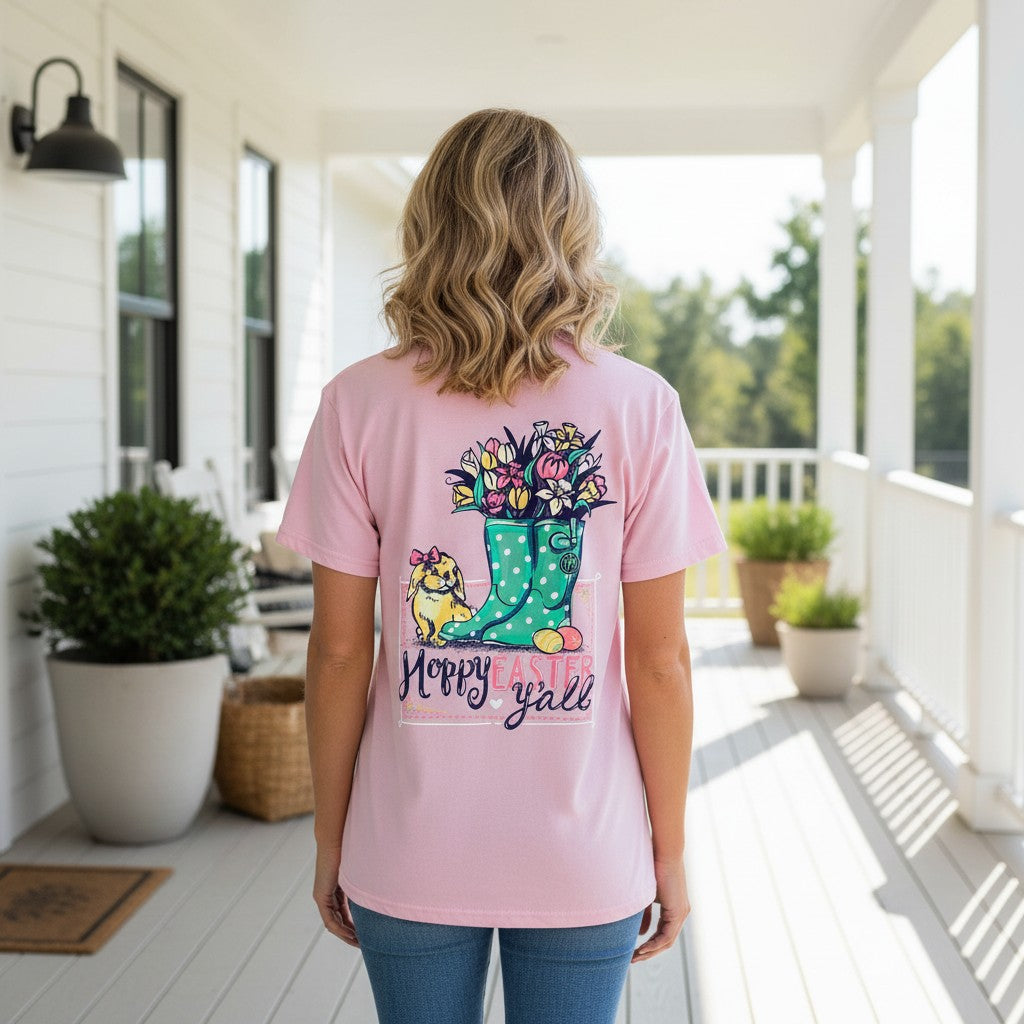 Back view of a woman wearing the HOPPY EASTER YALL TEE- Girlie Girl Orginals in pink with floral design.