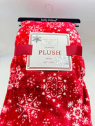 Red Christmas Cheer Plush Throw Blanket by Kathy Ireland, featuring snowflake patterns and flannel fleece mix, 50 x 60 inches.