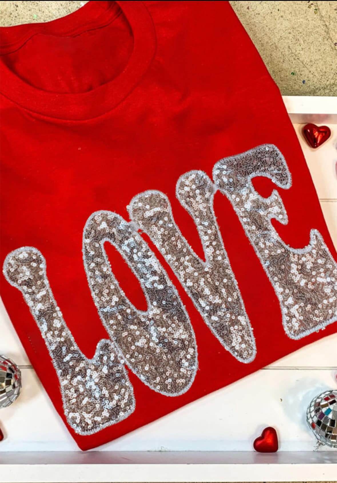 Red Love Letters Tee with sequined 'LOVE' design, perfect for romantic summer outfits and Valentine's Day.