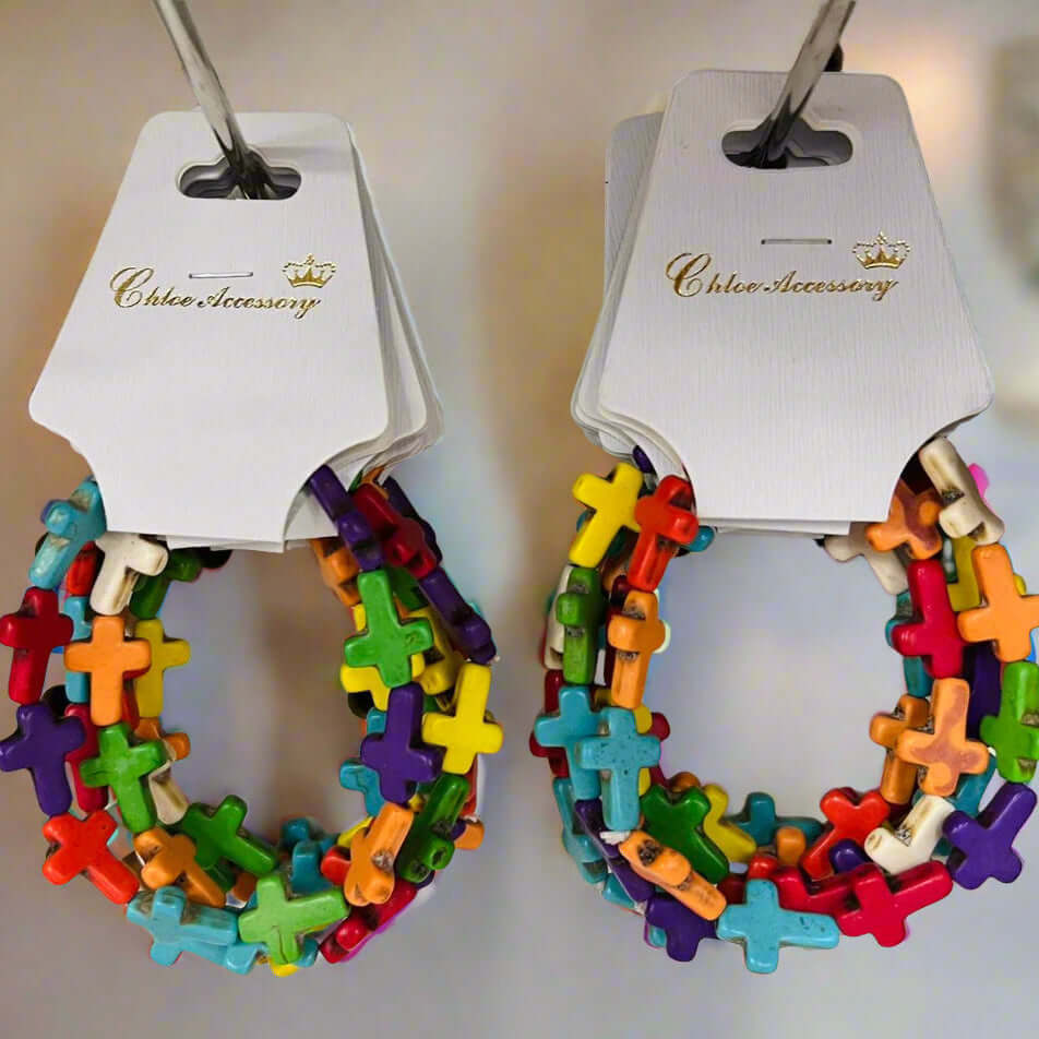 Colorful cross beaded bracelet by Chloe Accessory, handmade, vibrant wooden beads on a stretchy band.
