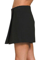 Side view of Sable Sensation Skort by Zenana in black, showcasing the unique skirt and shorts design.