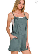 ZENANA TELL ME ROMPER in ash jade color with tie straps and chest pocket, showcasing effortless summer style.