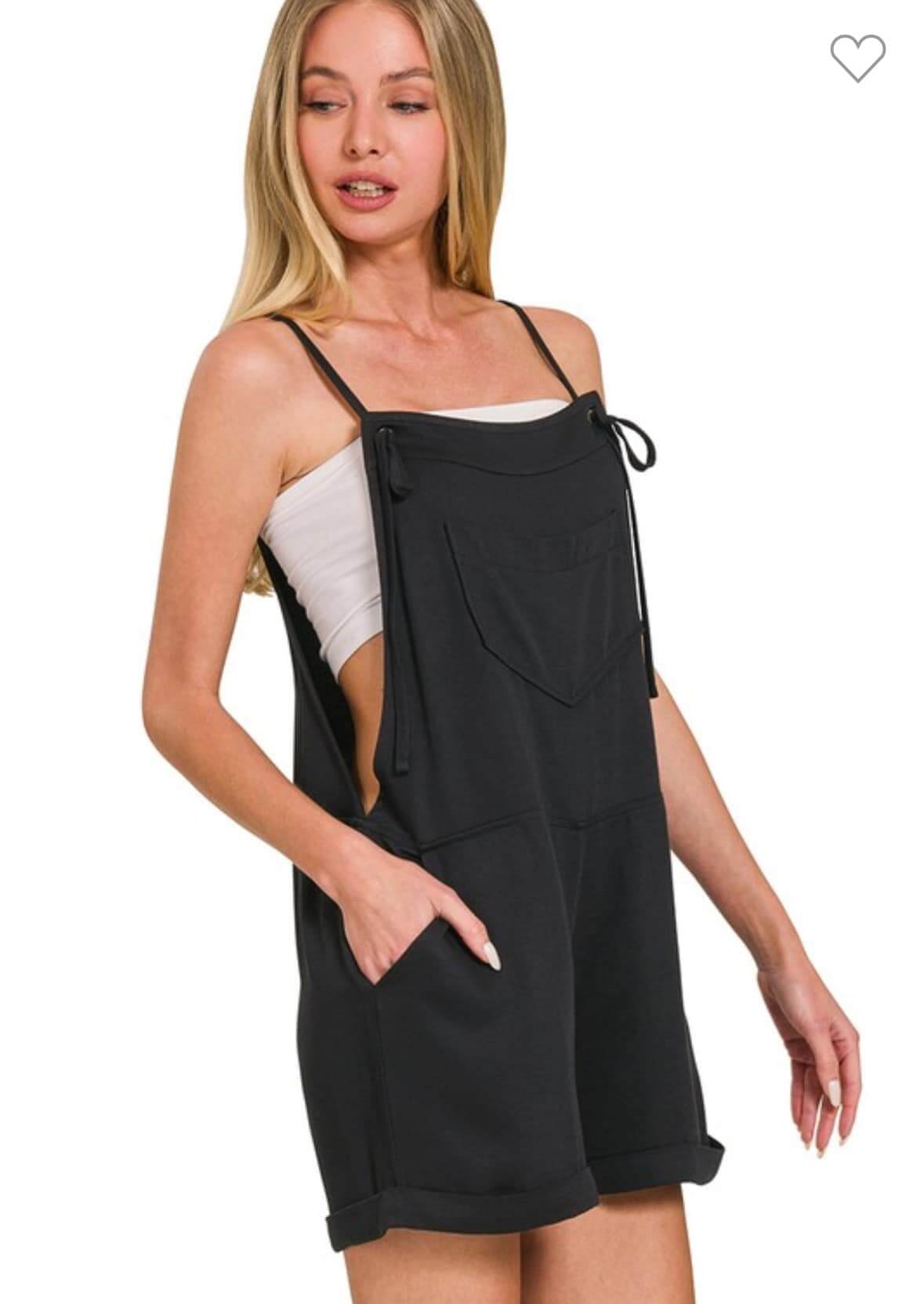 ZENANA Tell Me Romper in black featuring tie knot straps and chest pocket for effortless style and comfort.