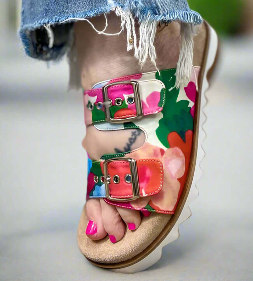 Corkys Dash Sandals in vibrant floral print with adjustable straps, perfect for sunny days and beach outings.