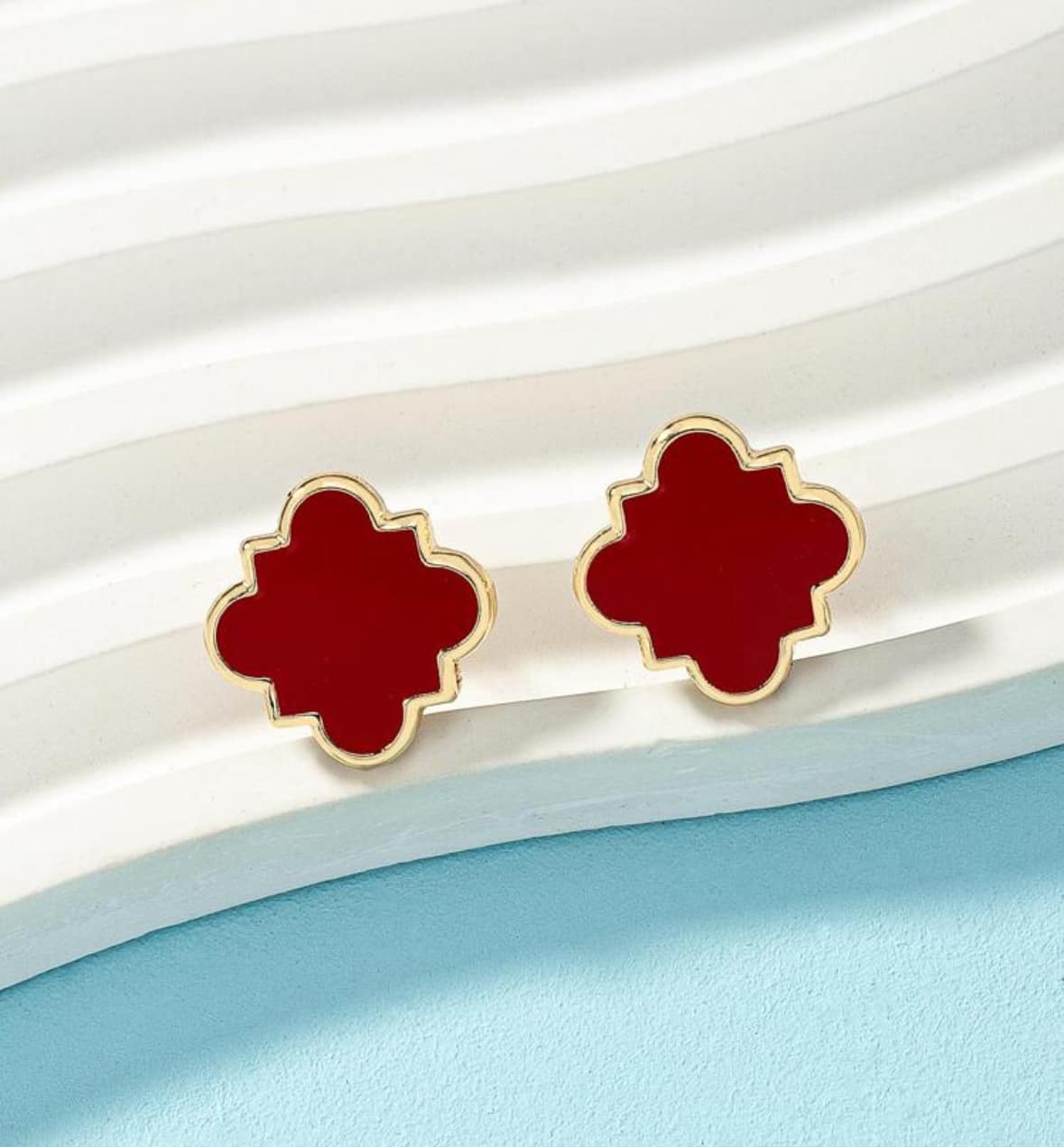 Bold red geometric earring studs with gold tone trim by Vivian-Lu, enhancing style and sophistication.