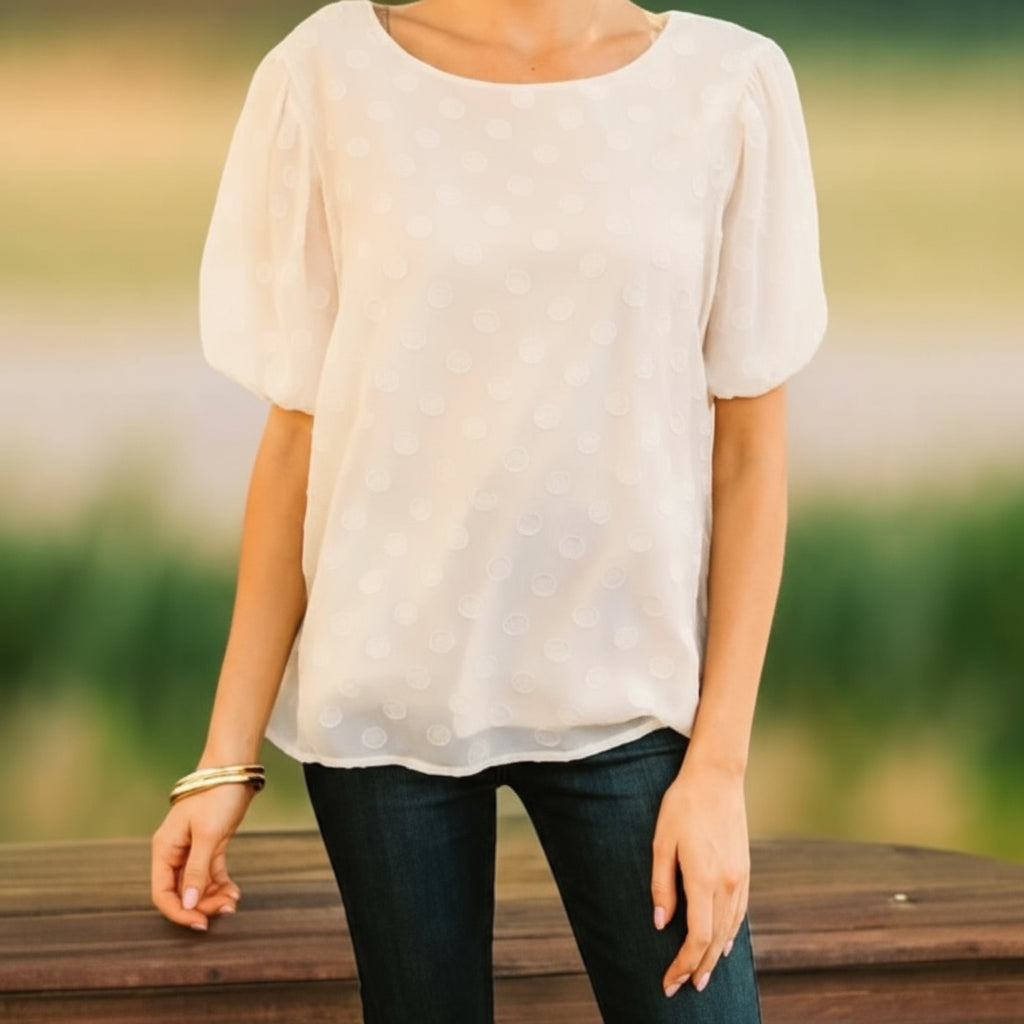 Umgee Pointed Conversations Top in cream with polka dots and bubble sleeves, ideal for relaxed or dressed-up outfits.