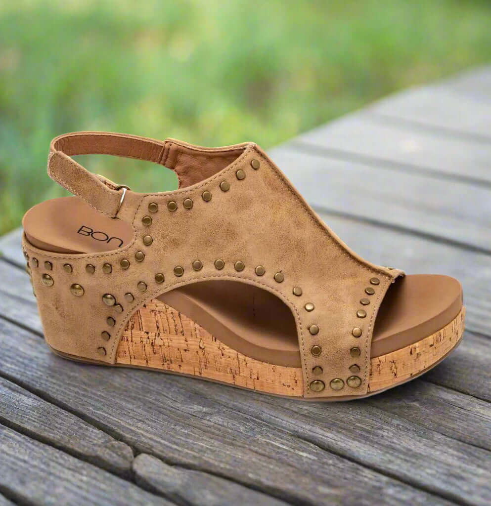 Corkys Carley Studded Wedges in tan, featuring a cork heel and adjustable strap for comfort and style.