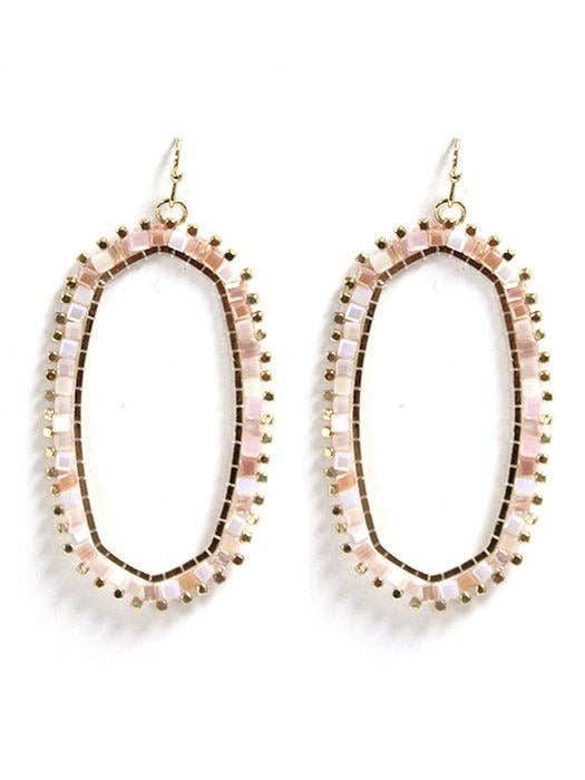 Stylish pink and gold beaded hoop earrings with an elegant design, perfect for adding a touch of sophistication to any outfit.