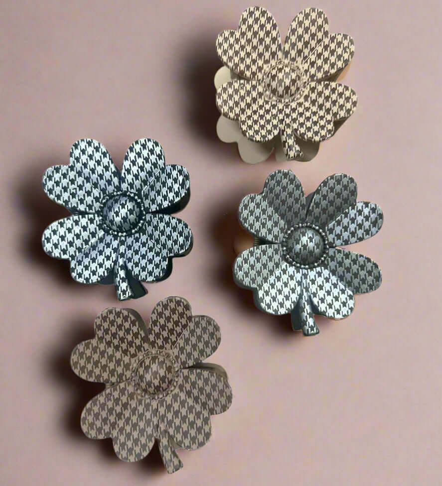 Houndstooth flower claw clips from the Crystal Collection by UP, showcasing four chic colors and patterns.