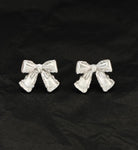 SILVER BOW Stud Earrings from the Vivian-Lu collection, featuring a stylish bow design and flawless texture.