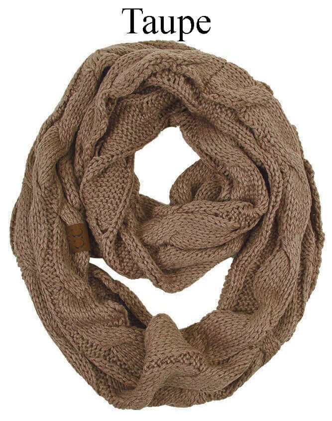 Cozy taupe C.C Story Book Knitted Infinity Scarf in cable knit design, perfect for winter fashion.