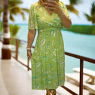 Lime green midi dress with seashell print, perfect for summer beach outings and casual brunches.