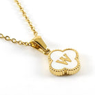 MONOGRAM MOMENTS NECKLACE featuring a gold pendant with the letter 'W' on a delicate chain.