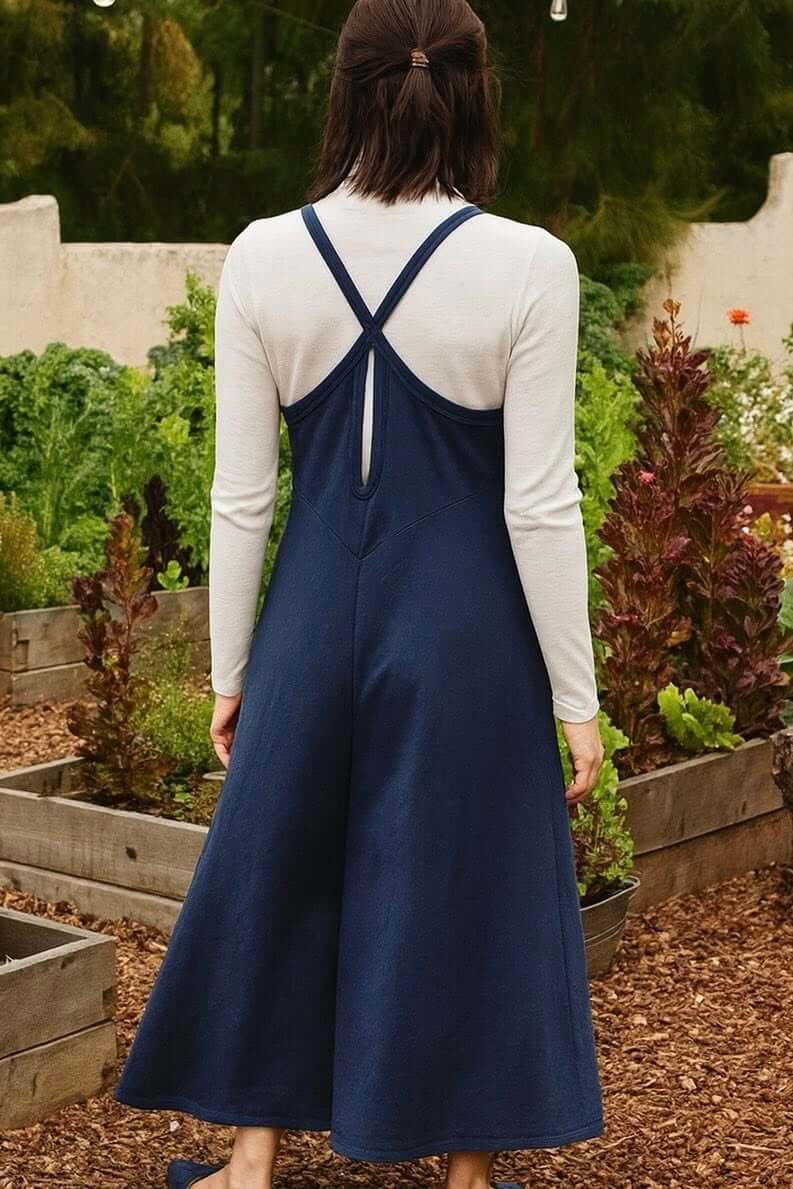 Back view of the EVERY DAY ESCAPE JUMPSUIT in navy, featuring wide legs and keyhole detail.