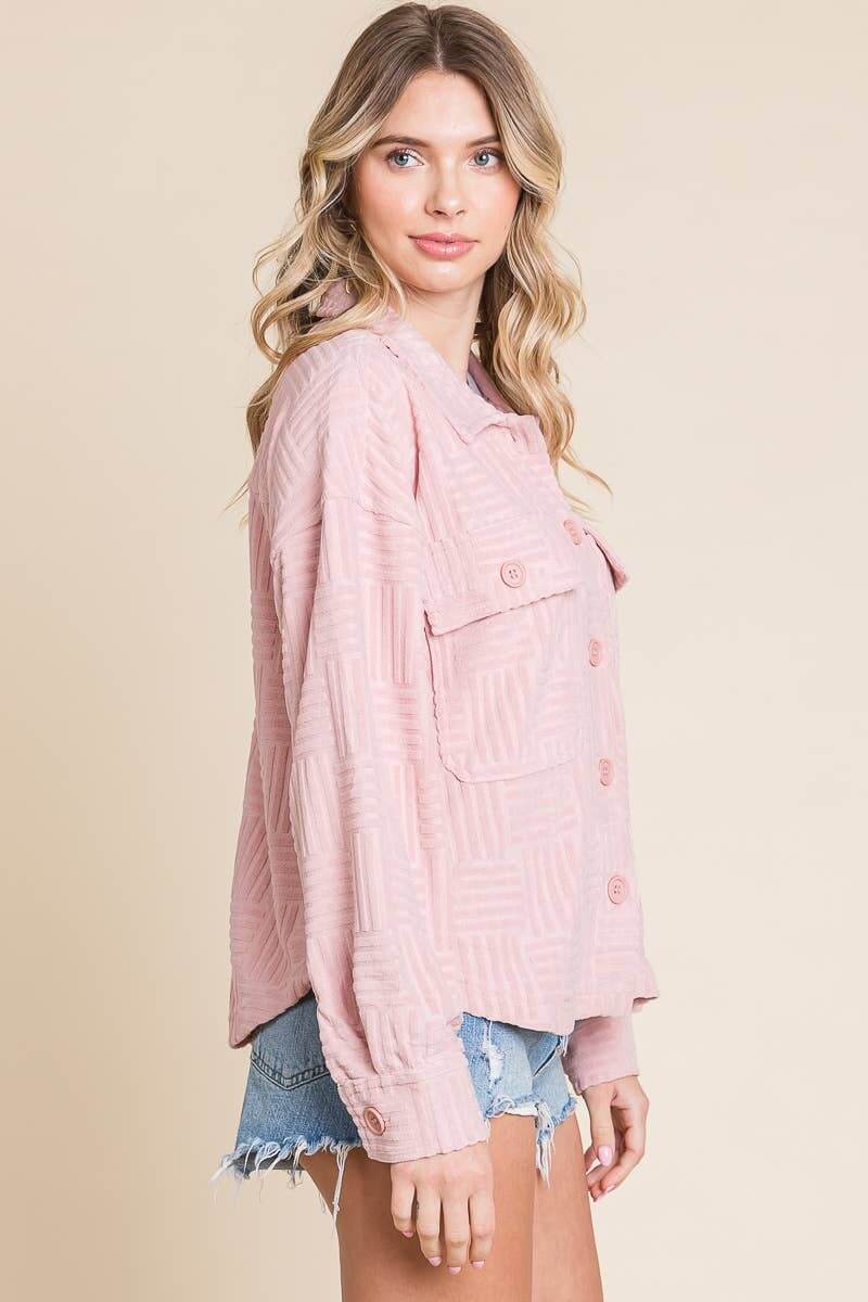 Women's embossed soft casual shacket in pink, featuring relaxed sleeves and flap pockets, ideal for layering.