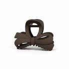 DAILY DARLING BOW HAIR CLIP (6 colors) in brown, featuring a smooth matte finish and timeless bow design.