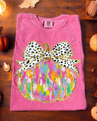 Pink Crunchberry Pumpkin Art Tee with vibrant applique on soft cotton fabric, perfect for autumn style and comfort.